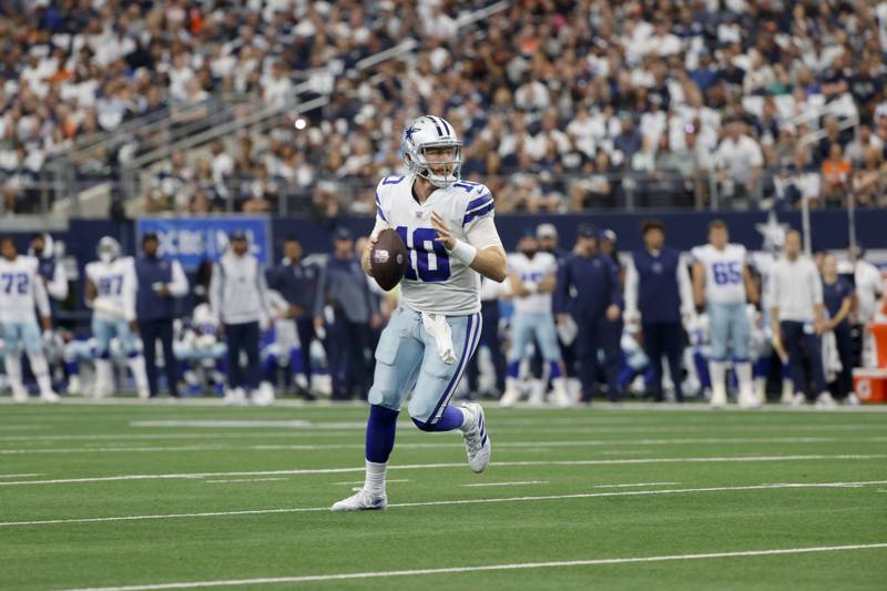 Dallas Cowboys quarterback Cooper Rush (10) prepares to throw a pass against the Cincinnati Bengals during an NFL Football game in Arlington, Texas, Sunday, Sept. 18, 2022. (AP Photo/Michael Ainsworth)