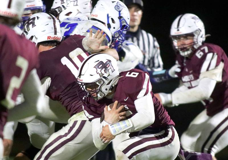 Prairie Ridge’s Luke Vanderwiel runs the ball against Vernon Hills in IHSA football Class 5A first-round playoff action at Prairie Ridge High School in Crystal Lake on Friday, October 31, 2025.
