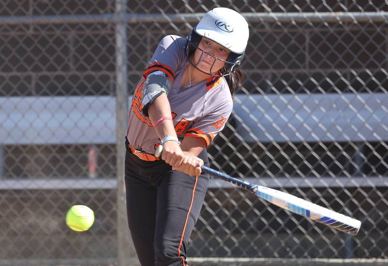 DeKalb's Emma Hart slaps the ball toward third during their Class 4A regional semifinal game against Rockford Auburn Wednesday, May 22, 2024, at Hampshire High School.