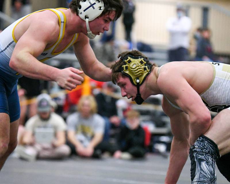 Sycamore wrestler Brayden Peet wrestles Glenbrook South in the final match up of the 152 weight class during the final match up the day on Saturday Jan 8th. and took 1st place.
