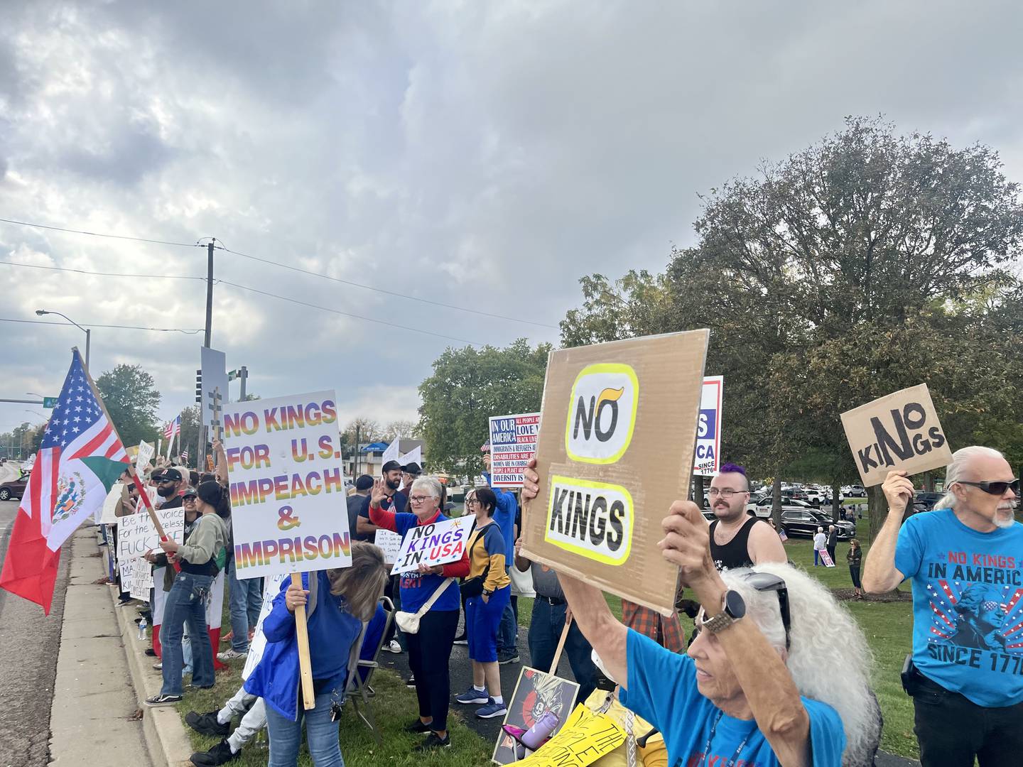 Hundreds of community members lined Sycamore Road in DeKalb for the “No Kings” protest on Oct. 18, 2025.