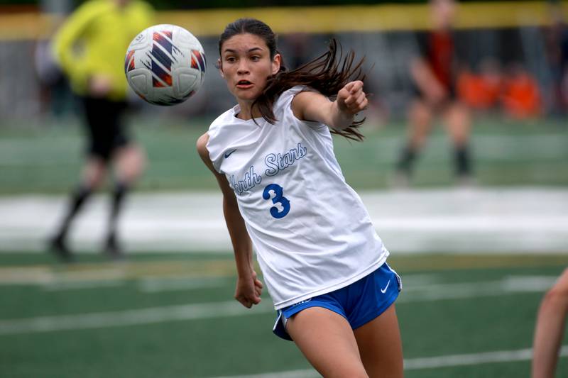 St. Charles North's Aubri Magana goes after the ball during a Class 3A Glenbard West Sectional semifinal game against St. Charles East on Tuesday, May 27, 2025 in Glen Ellyn.