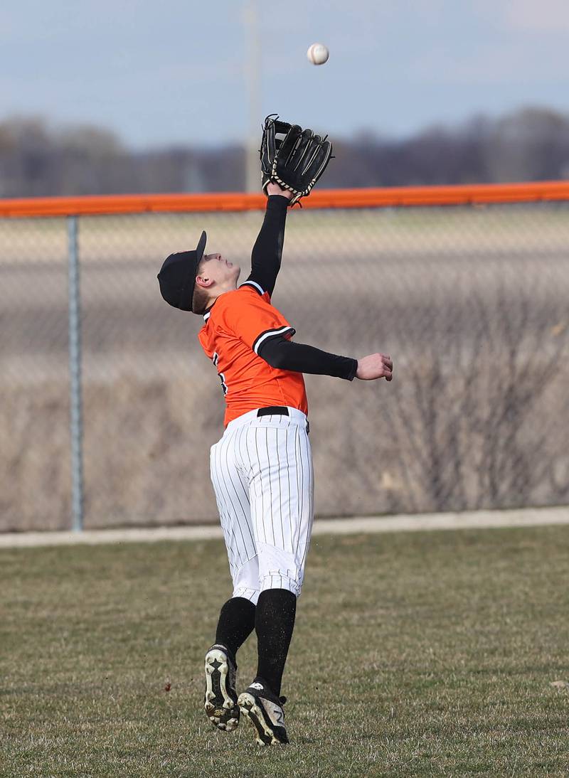 DeKalb's Paul Kakoliris makes a leaping catch during their game against Jefferson Wednesday, April 6, 2022, at DeKalb High School.