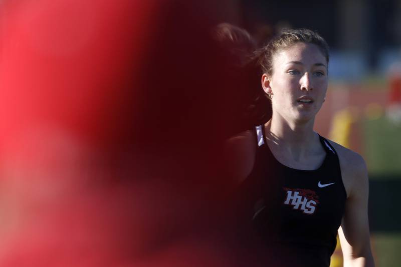 Huntley’s Morgan Sauber races in  the 800 meter run on Thursday, May 8, 2025, during the Fox Valley Conference Girls Track and Field Meet at Huntley High School.