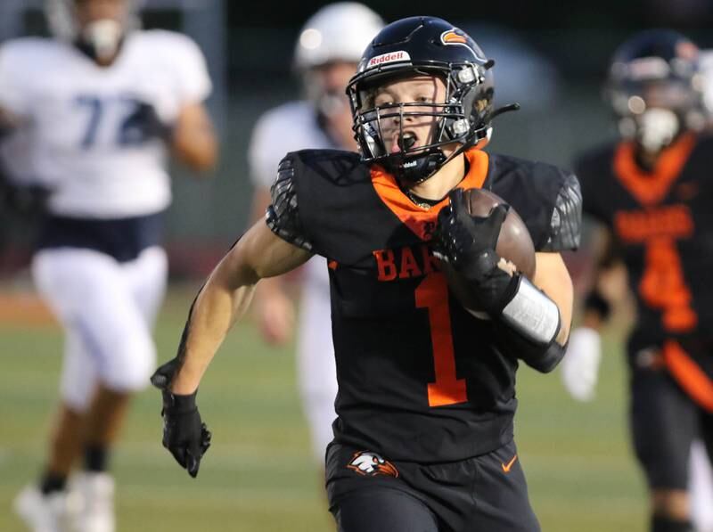 DeKalb's Talen Tate gets behind the Plainfield South defense on his way to a long touchdown during their game Friday, Sept. 1, 2023, at DeKalb High School.