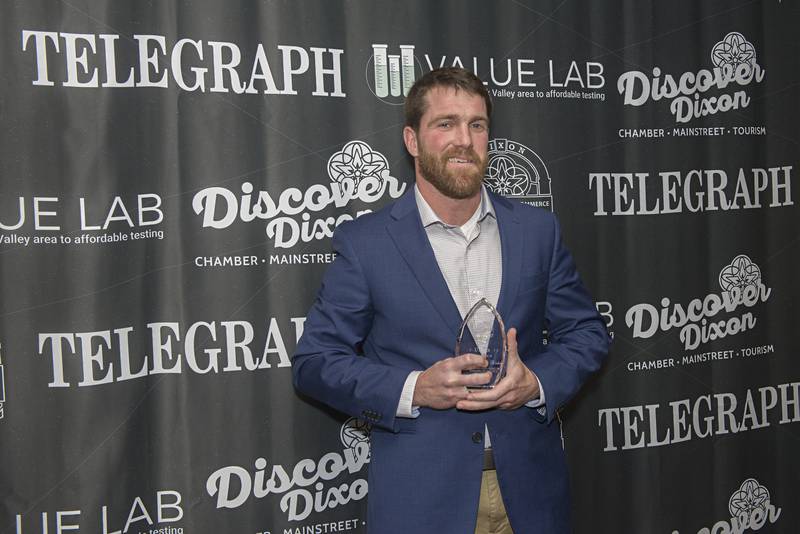 Chris Bishop accepts his under 40 award Friday, May 6, 2022 at the Best of Dixon awards.