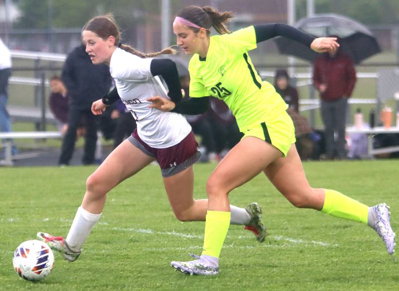 Marengo’s Maggie Hanson, left, races Richmond-Burton’s Nadia Layer for the ball in IHSA Class 1A Regional Title Game action soccer at Marengo High School in Marengo on Wednesday, May 21, 2025.