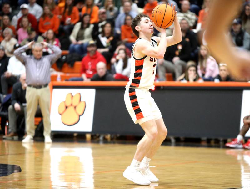 Wheaton Warrenville South's Connor Butler shoots three points during a game against Batavia on Friday, Feb. 14, 2025 in Wheaton.