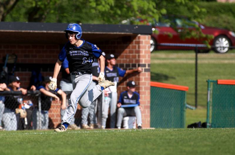 Geneva's Tate Beran runs home during a game against St. Charles East on Tuesday, May 13, 2024 in St. Charles.
