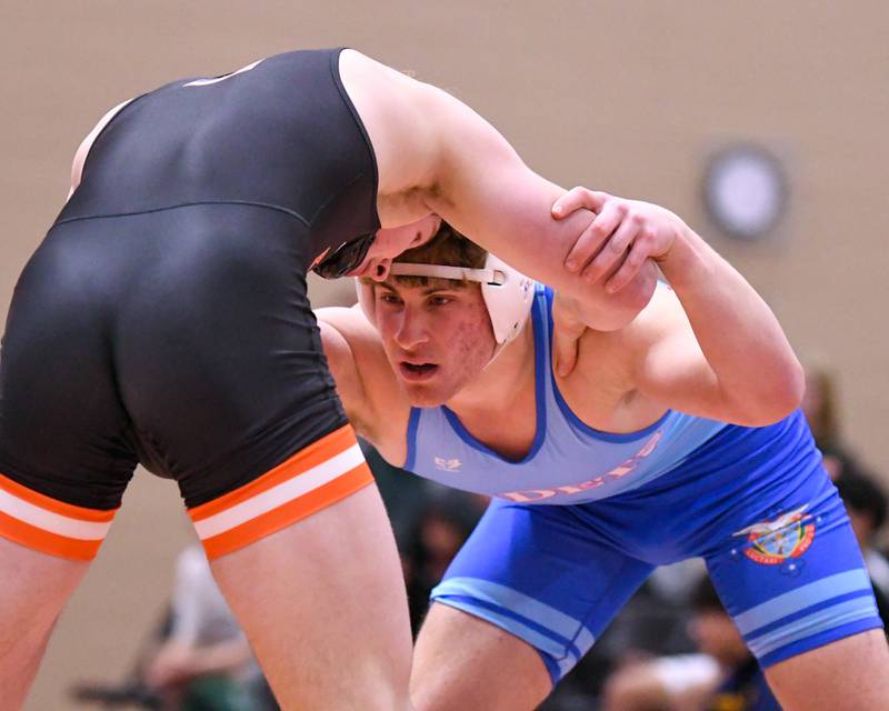 Marmion Vincenzo Testa, right, wrestles against Brady Sprangers of Kaukana Wisconsin in the 190-weight class on Tuesday Dec. 30, 2025, during the Flavin Invite held at DeKalb High School.