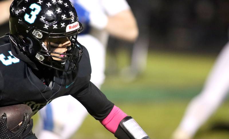 Woodstock North’s Braeden Berner runs the ball against Woodstock in varsity football at Woodstock North High School on Friday, October 24, 2025.