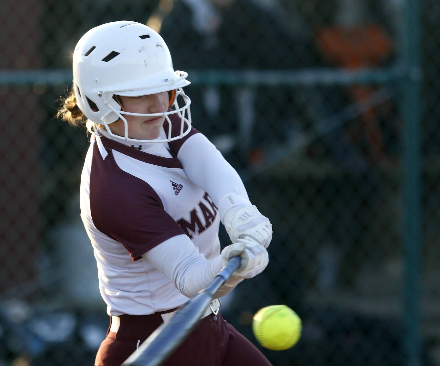 Marengo's Gabby Christopher connects with the ball during a nonconference softball game against Antioch on Monday, March 31, 2025, at Marengo High School.