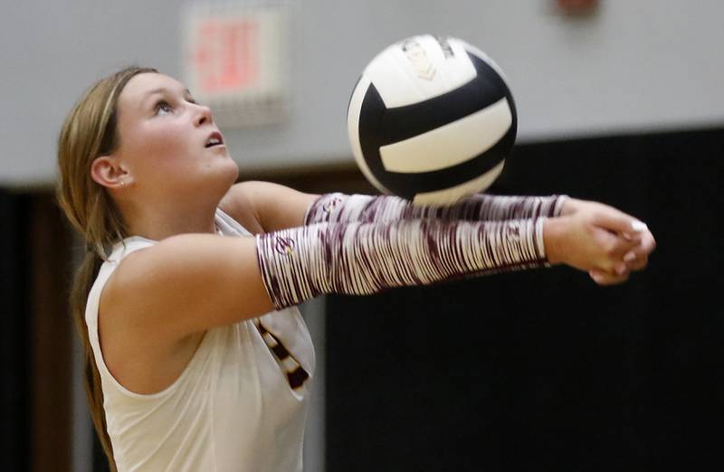 Woodstock North's Adelyn Crabill bumps th eball during a Kishwaukee River Conference volleyball match against Woodstock North on Monday, Sept. 15, 2025, at the Woodstock North High School.