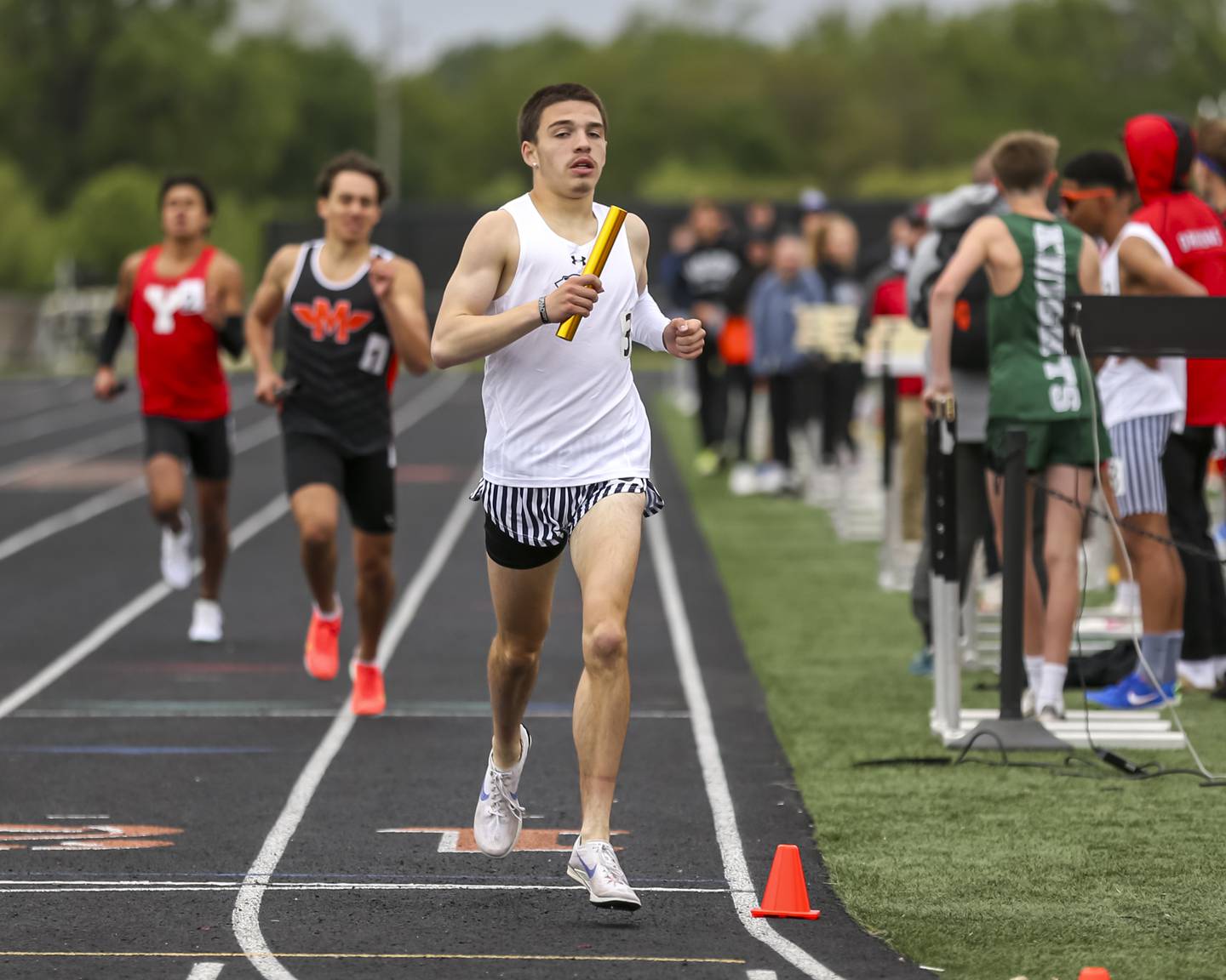 Dylan Buturusis anchors Plainfield South to victory in the 4x800m at the Class 3A Minooka Sectional Boys Track and Field Meet Wednesday, May 21, 2025 in Minooka.