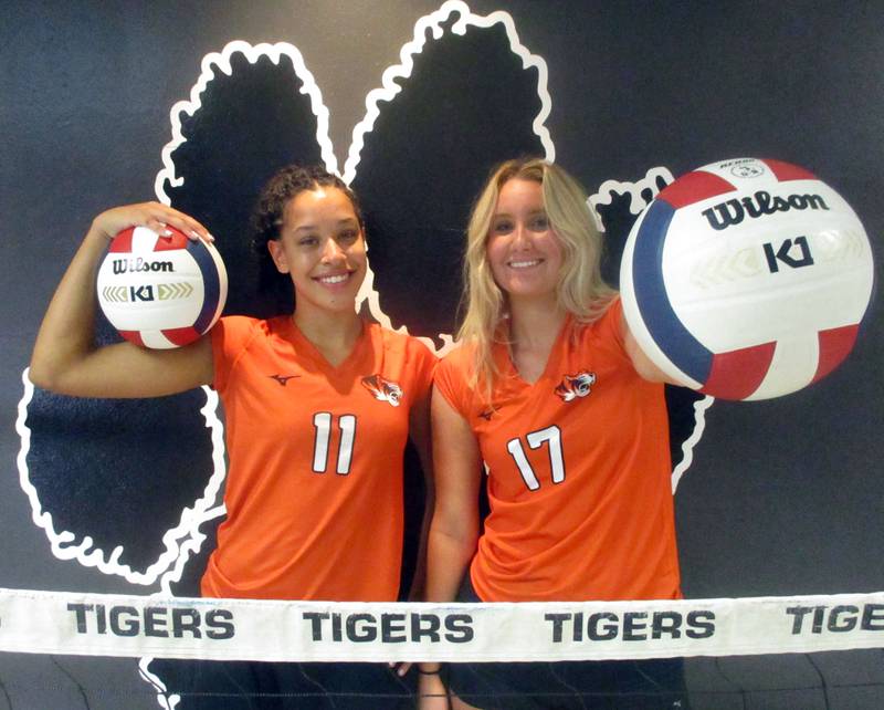 Wheaton Warrenville South seniors Maddie Mlady-Gibson (left) and Becca Bellows were both named to the Wheaton Classic All-Tournament team for the Tigers, who took seven at the 24-team event.