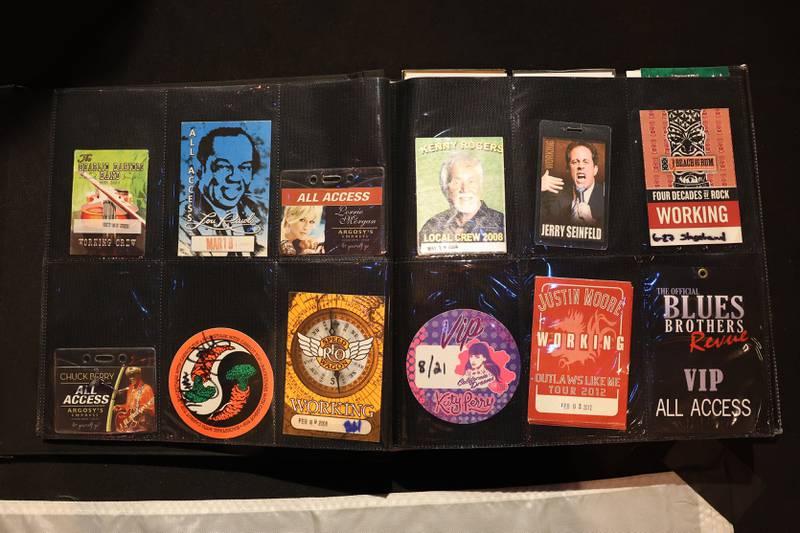 An album with past credentials sits on display at the Rialto Theater’s 100th anniversary celebration on Sunday, May 3, 2026 in Joliet.