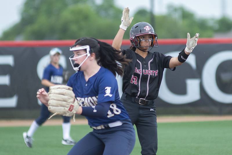 Antioch’s Eden Echevarria celebrates a double against Lemont Friday, June 10, 2022 in the class 3A IHSA state softball semifinal game.