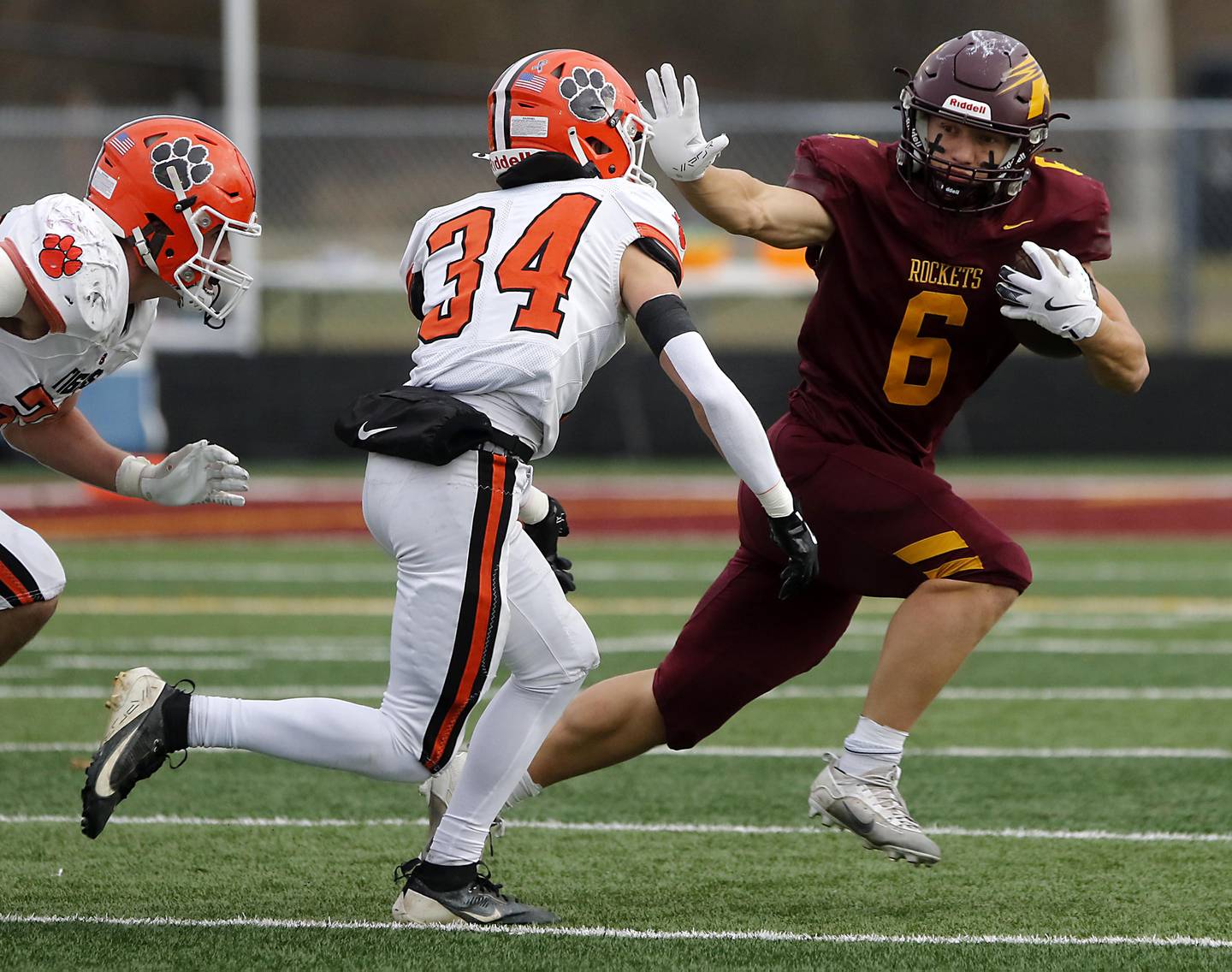 Richmond-Burton's Hunter Carley runs the ball against Byron’s Landon Bonvallet during an IHSA Class 3A semifinal playoff football game on Saturday, November 22, 2025, at Richmond-Burton High School, in Richmond.