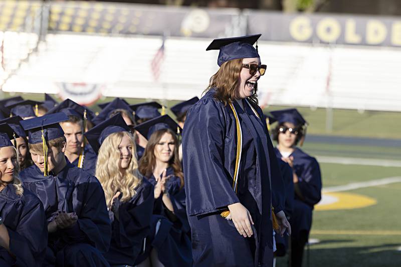 English department award winner Riley Dunn collects her award during graduation at Sterling High School Friday, May 26, 2023.