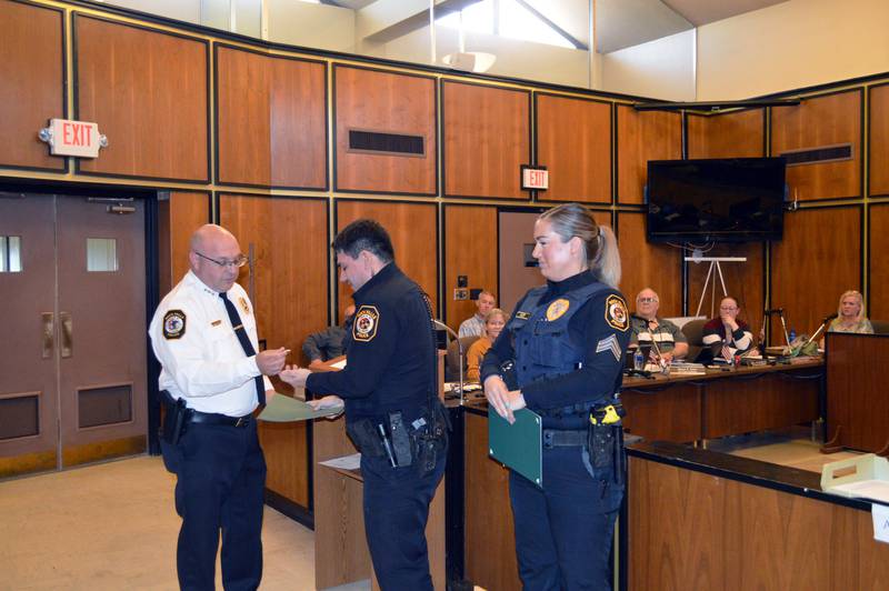 Rock Falls Police Chief David Pilgrim, Officer Kristofer Perez and Sgt. Betony Gluff were presented with the Lifesaving Award during the March 19, 2024, Rock Falls City Council meeting for their work responding to a Feb. 14 call.