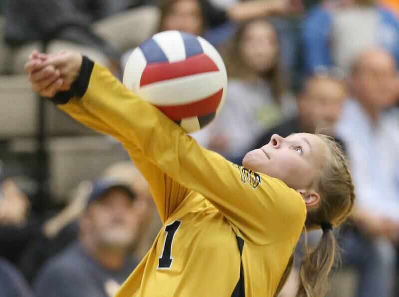 Putnam County libero Ella Pyszka hits the ball back to the St. Bede side of the net on Tuesday, Sept. 24, 2024 at St. Bede Academy.
