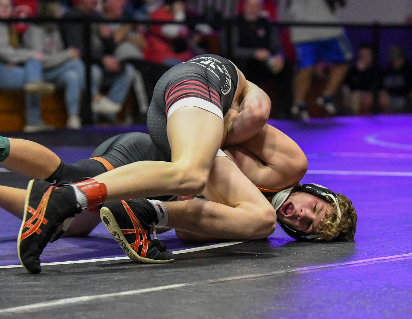 Sandwich wrestler Kadin Kern competes during the 126 weight class championship match Saturday Dec. 10th at the Plano Reaper wrestling classic held at Plano high school where he took second.