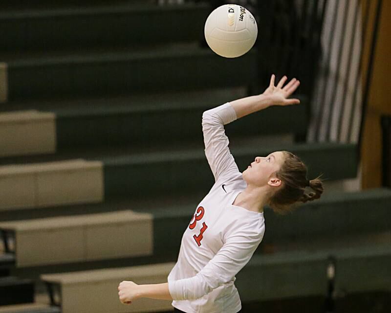 Earlville's libero Emily Harness serves the ball against Putnam County in the Class 1A Regional game on Monday, Oct. 24, 2022 at St. Bede Academy in Peru.