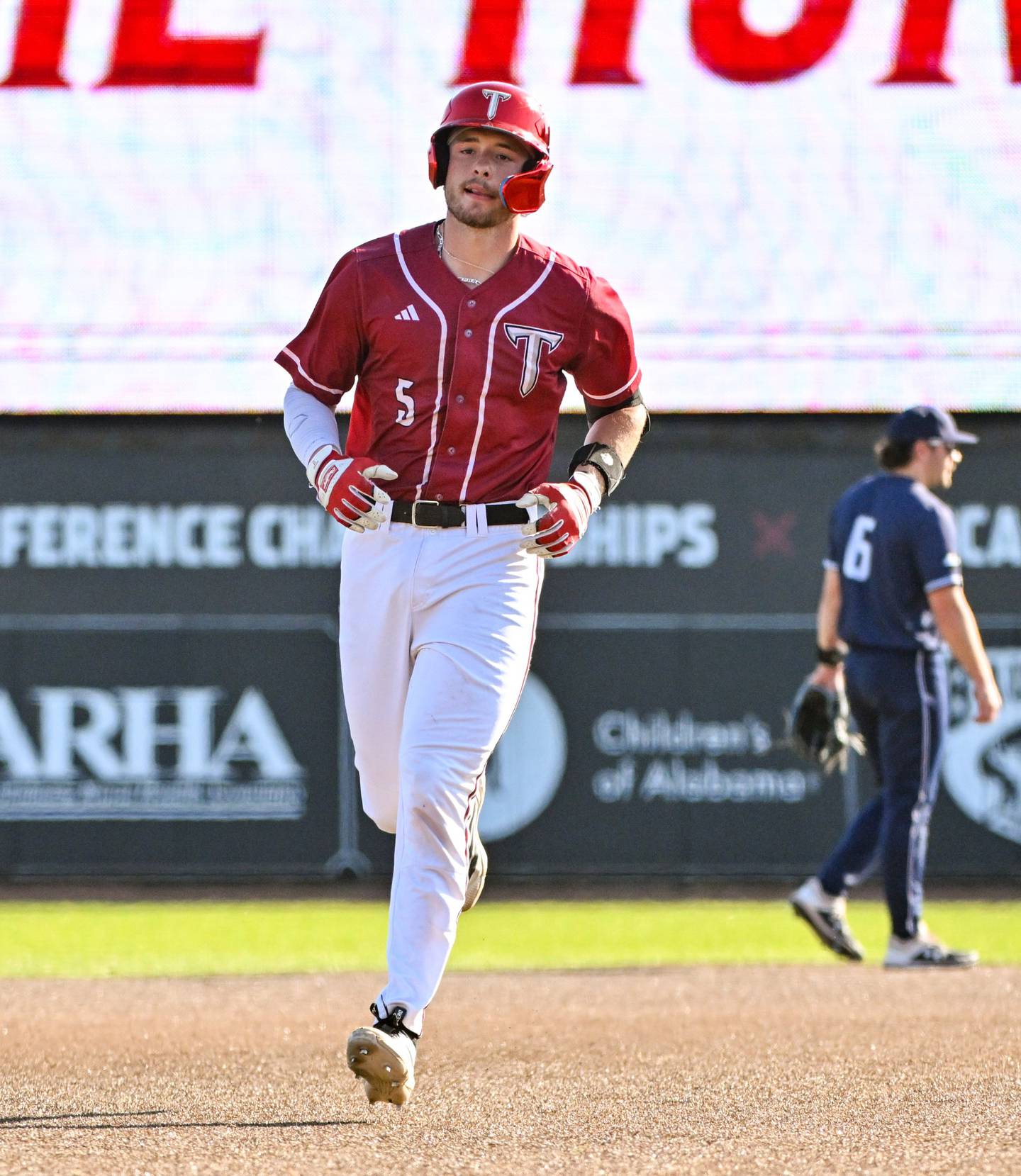 Downers Grove North graduate Jimmy Janicki, a sophomore catcher, leads his team in batting average, home runs and RBI at Troy University in Alabama.