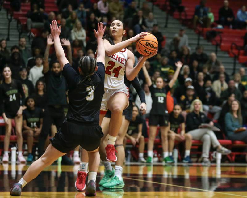 Benet's Emma Briggs (24) goes up for a shot during their Class 4A Bolingbrook Sectional final basketball game between Waubonsie Valley at Benet. Feb 27, 2025 in Bolingbrook.