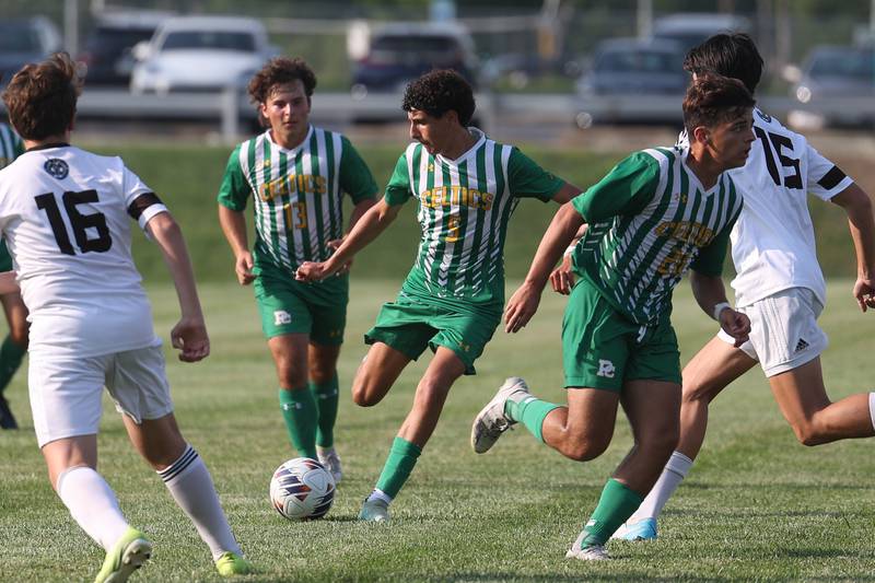 Providence’s Billy Savarino Jr. looks to pass against Joliet Catholic on Aug. 21, 2023 in New Lenox.