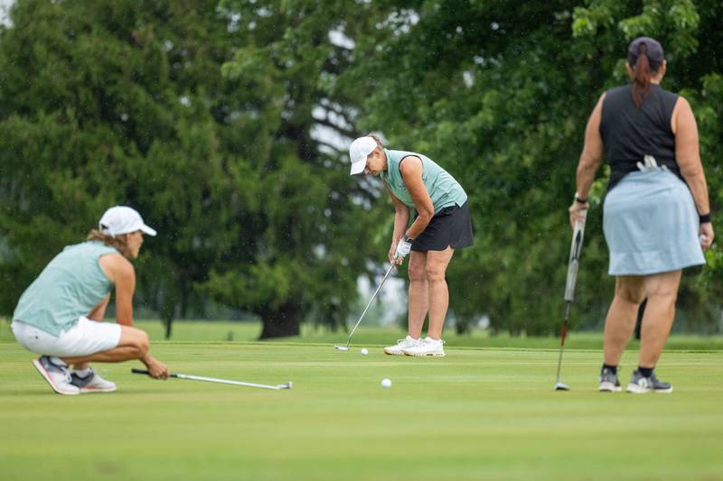 Kristen McClendon of Deer Park watches her putt roll on green on Saturday, August 10, 2025 at the annual Illinois Valley Women's Golf Tournament at Edgewood Golf Club in McNabb.