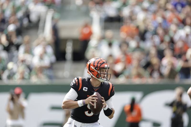 Cincinnati Bengals quarterback Joe Burrow (9) during the first half of an NFL football game against the New York Jets Sunday, Sept. 25, 2022, in East Rutherford, N.J. (AP Photo/Adam Hunger)