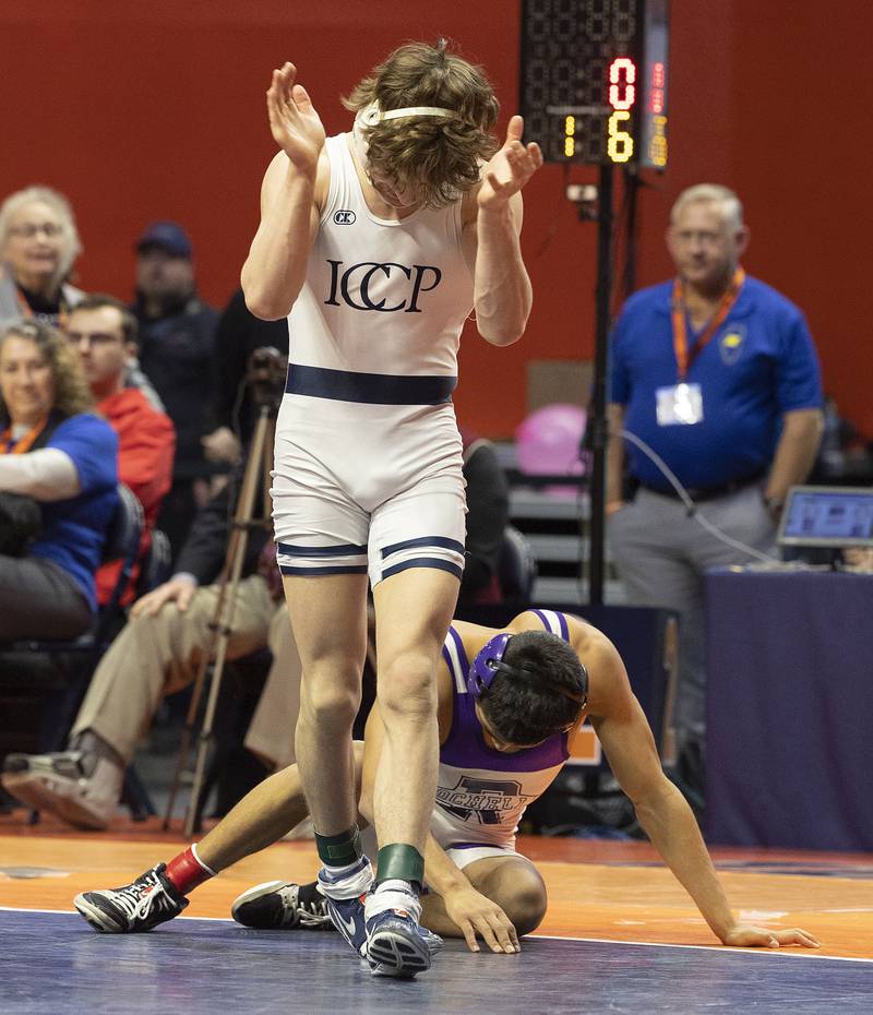 IC Catholic’s Max Cumbee celebrates hit win over Rochelle’s Xavier Villalobos in the 126 pound weight class of the 2A state individual wrestling finals Saturday, Feb. 22, 2025, at State Farm Center in Champaign.