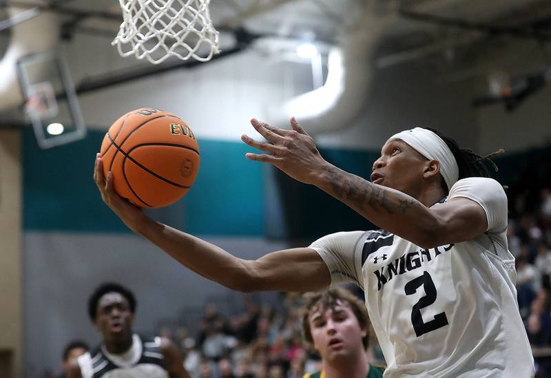 Kaneland's Isaiah Gipson drives to the basket during the IHSA Class 3A Woodstock North Sectional final basketball game against Crystal Lake South on Friday, March 6, 2026, at Woodstock North High School.