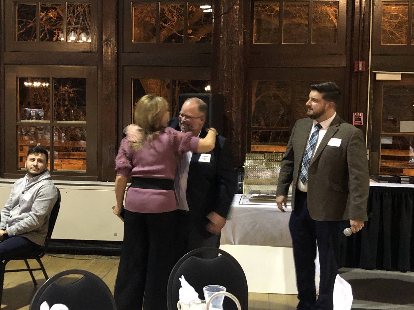 IVAC representatives give Dawn Farneti the volunteer of the year award for her service at the IVAC chamber dinner at Starved Rock Lodge on Thursday, Dec 8, 2022.