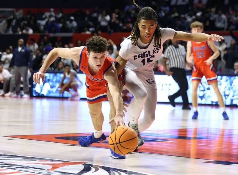 Eastland's Peyton Spears (left) and Chicago Hope Academy's Noah Jones go after a loose ball during their IHSA Class 1A state championship game Saturday, March 15, 2025, in the State Farm Center at the University of Illinois in Champaign.