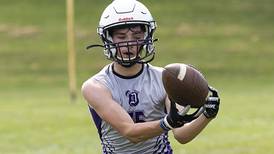 Photos: Dixon takes the field for first day of football practice