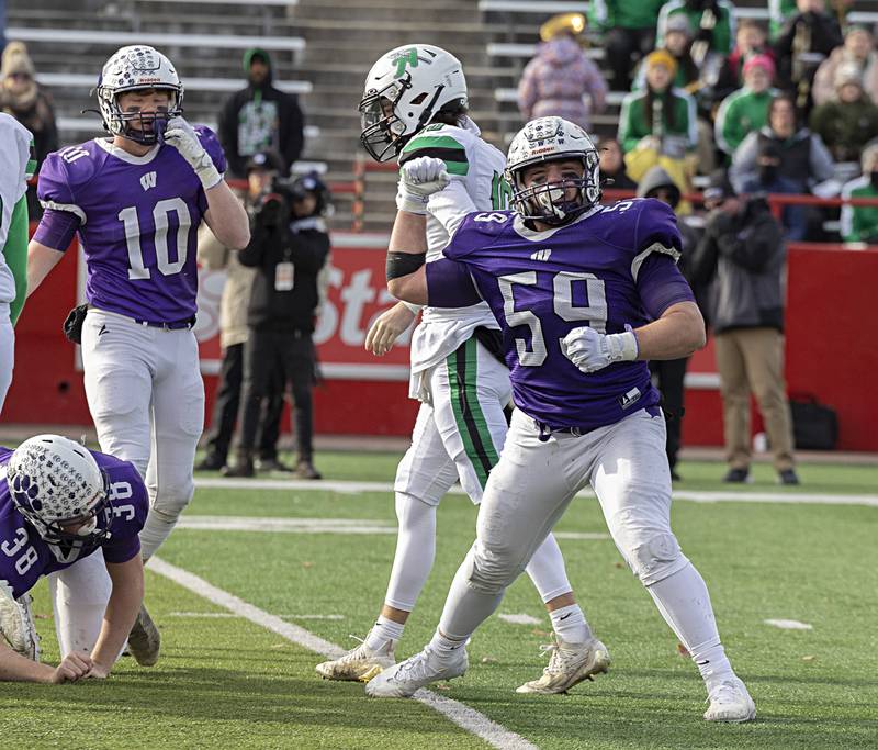 Wilmington's Zach Ohlund celebrates a tackle for a loss Friday, Nov. 24, 2023 in the 2A state football championship game at Hancock Stadium in Normal.