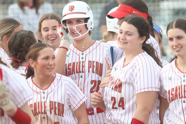 Photos: Lady Cavs softball triumphs over Morton as Anna Riva crushes three home runs