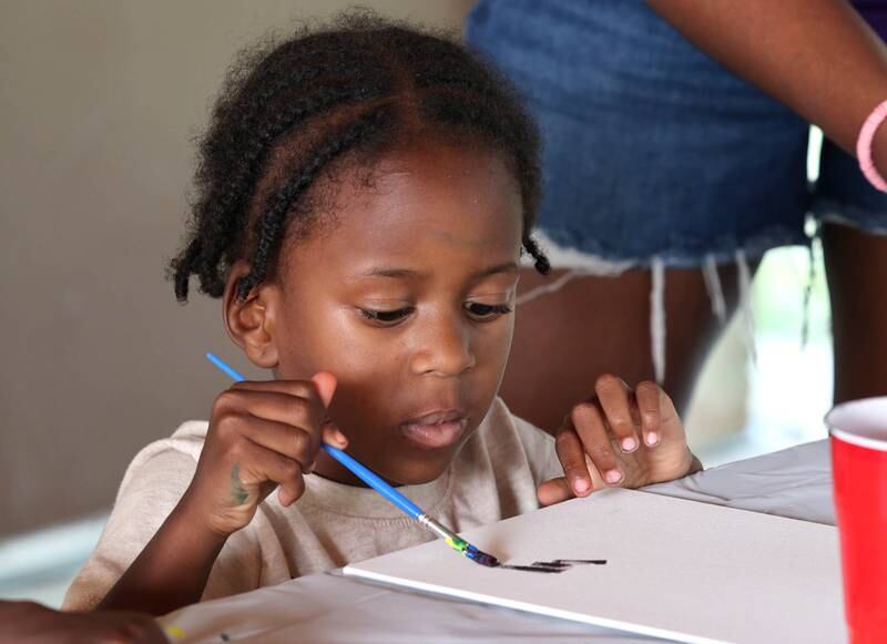 Aiden Morgan, 4, from DeKalb works on his painting during Fun Jam in the Park Tuesday, June 27, 2023, at Welsh Park in DeKalb. Fun Jam in the Park offers constructive activities for kids on Tuesday and Thursday through August 8th from 5-7 p.m. at various parks in DeKalb.