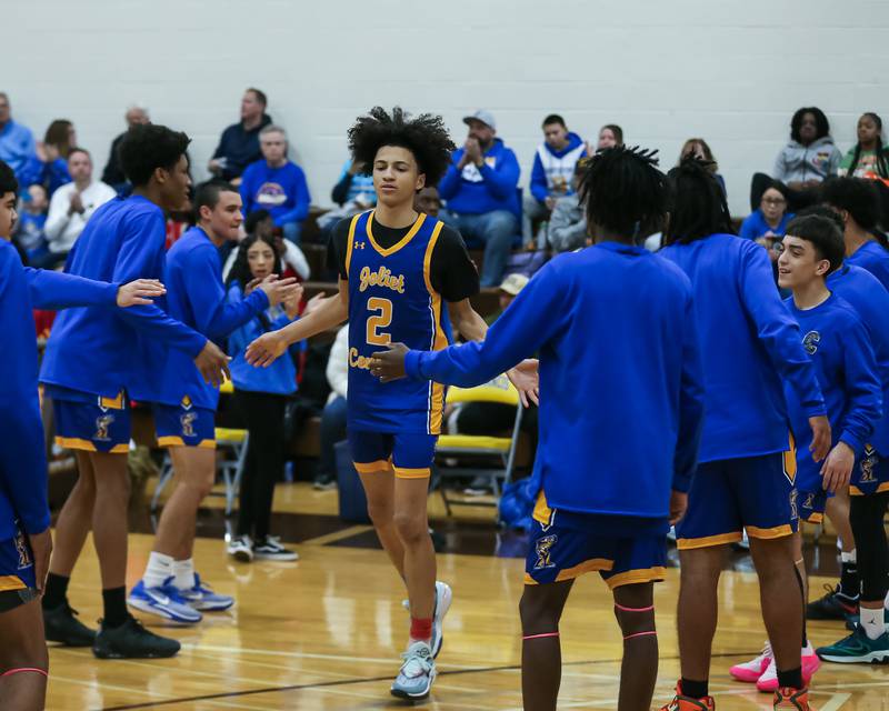 Joliet Central's Zion Kostyra (2) is introduced before the WJOL Tournament Championship game versus Bolingbrook. Nov 25, 2023.