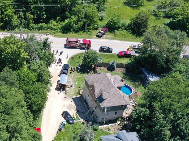 La Salle Co. Sheriff along with multiple Fire and EMS Companies work the scene at East 15th and North 1659th Road in Bruce Township on Tuesday July 12, 2022. Multiple injuries were  reported late Tuesday morning as workers with a home improvement company sustained electrical shocks in rural La Salle County, east of Leonore. The incident happened shortly after 11a.m.
