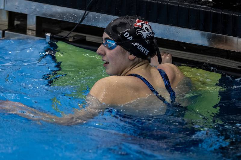 Lincoln-Way Central’s Genevieve Dal Ponte checks the board after competing in the 50 Yard Freestyle during the IHSA Girls State Swimming Preliminaries at FMC Natatorium in Westmont on Nov. 14, 2025.