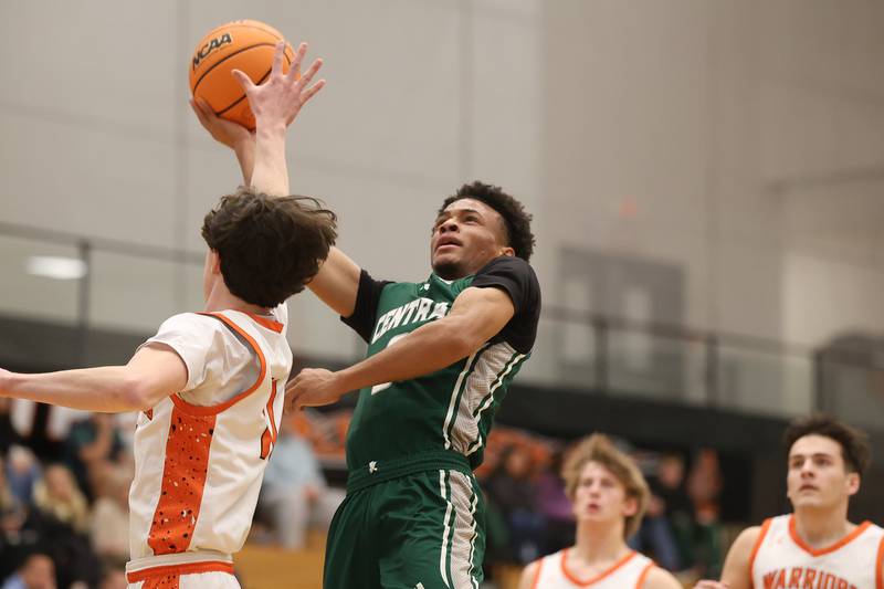 Plainfield Central’s Zion Finch finesses a shot against Lincoln-Way West on Saturday, Jan 3, 2026 in New Lenox.