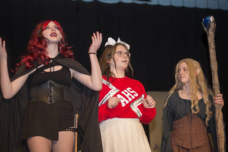 Lilith (left), Agnes and Kaliope, played by Rowan Onken, Rosie Knaggs and Hannah Zinke rehearse a scene  of Morrison High School’s “She Kills Monsters” on Wednesday, May 4, 2022.