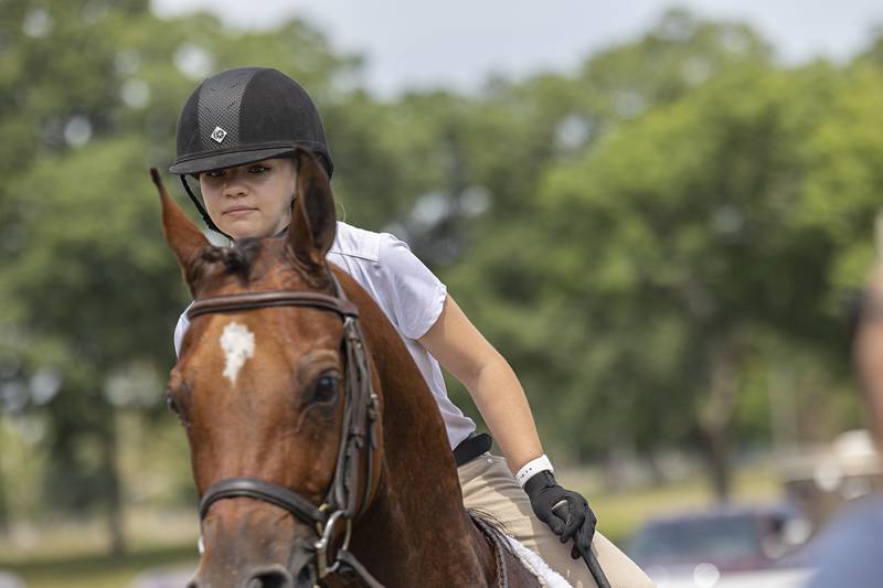 Linnea Thorngren, riding Afterfire AC, works on her form  Friday, July 14, 2023 at the Whitside County 4H fair. Friday saw the horse and pony show, the rabbit show and the poultry show just to name a few events. Other events will start at 9 am on Saturday at the fairgrounds in Morrison.