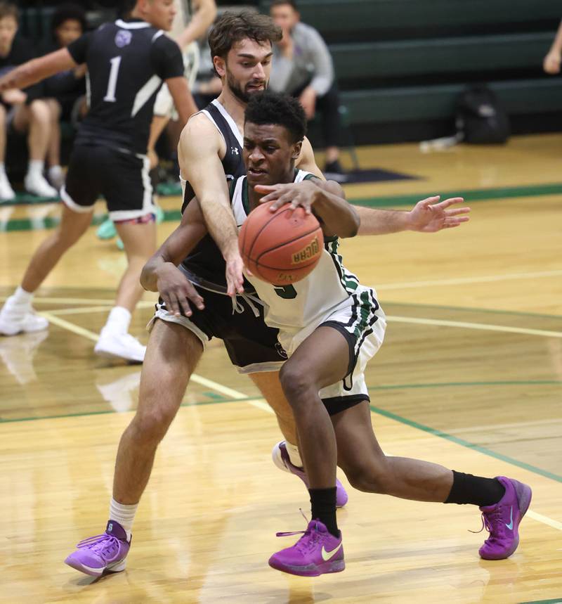 Kishwaukee College's Ramsey Bethel goes to the basket against Rockford University's Ryan Bella Thursday, Jan. 22, 2026, during their game at Kishwaukee College in Malta.