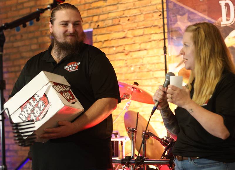 WALLS 102 hosts Zane and Dani draw names for prizes during the WALLS 102 Listener Appreciation Party on Friday, May 8, 2026 at the Auditorium Ballroom in La Salle.