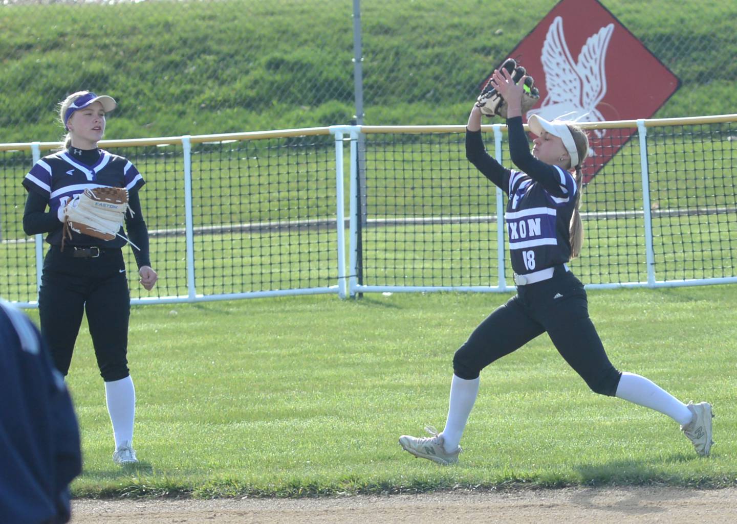 Dixon centerfielder Bailey Tegeler (18) catches a fly ball for an out against Oregon on Friday, April 5, 2024 at Oregon Park West