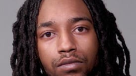 Man arrested in connection with shooting Friday in Joliet that left woman shot, 3 homes hit